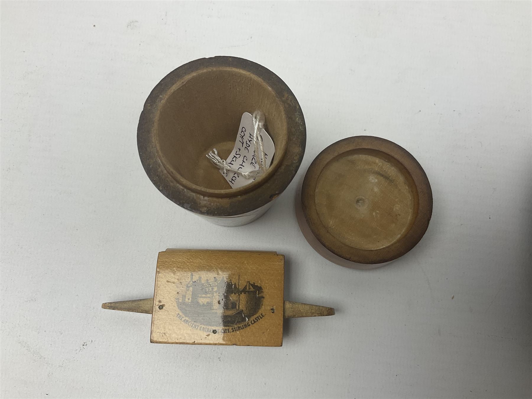 Two Mauchline ware boxes, comprising case modelled as a book depiciting The Ancient Entrance Gate, Stirling Castle, and lidded jar depicting Hythe Church, The Crypt, together with Russian lacquer box and other wood pot pourri bowl