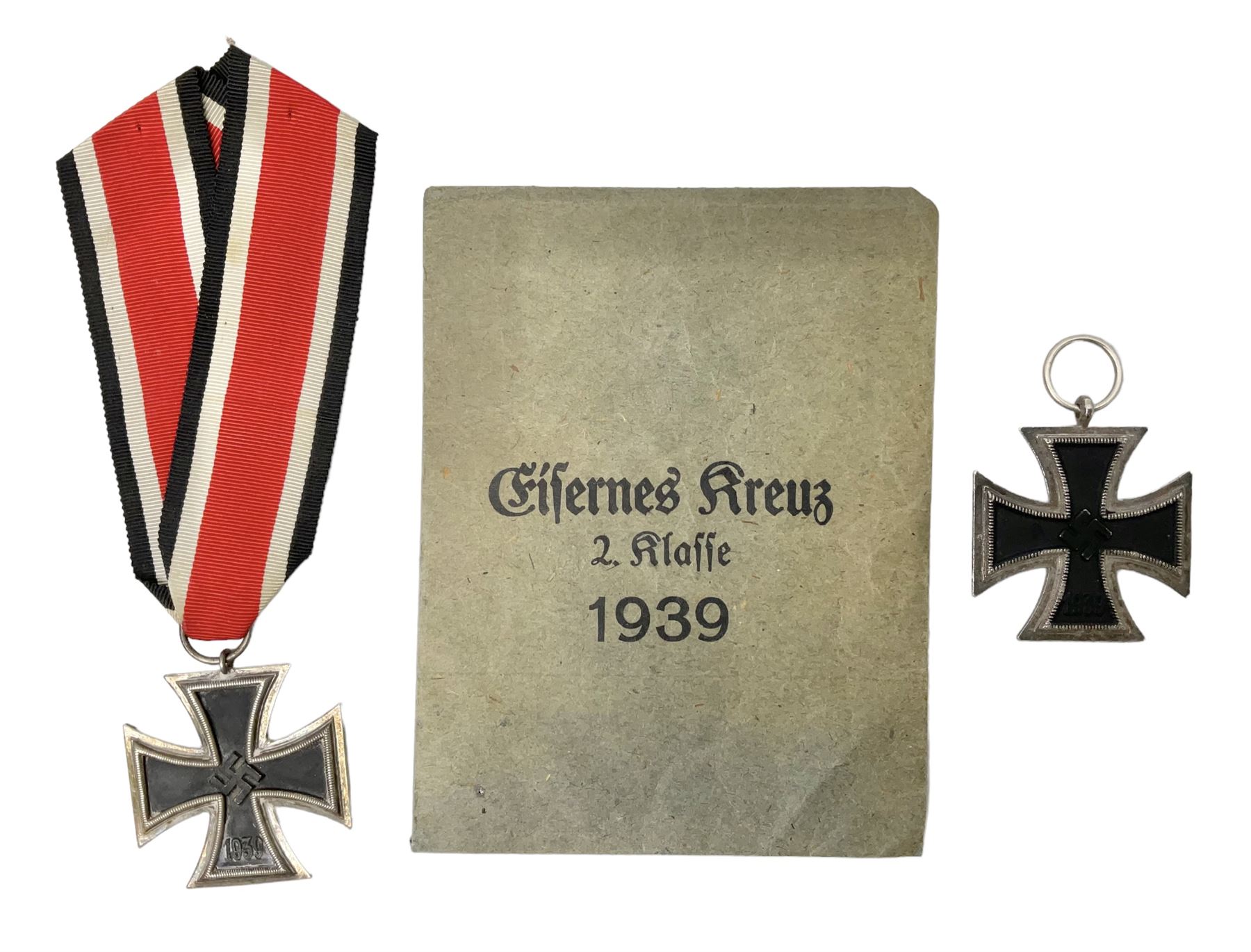 WW2 German Iron Cross 2nd Class with ribbon, ring stamped 44; and original issue packet; together with a copy of a WW2 Iron Cross