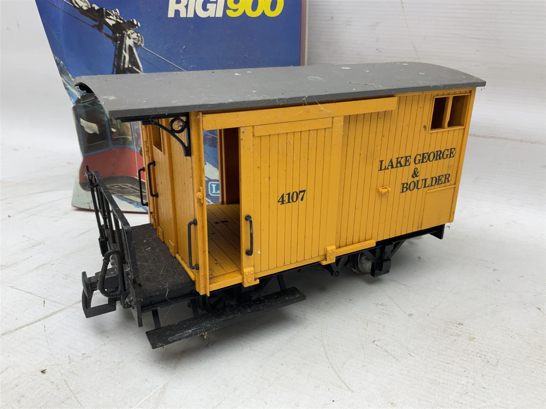Three LGB (Lehmann Gross Bahn) G scale, gauge 1, rolling stock wagons, comprising two Lake George and Boulder wagons and an Auto Express wagon, together with a LGB passenger coach, other LGB rolling stock and a Lehmann Rigi900 ski lift