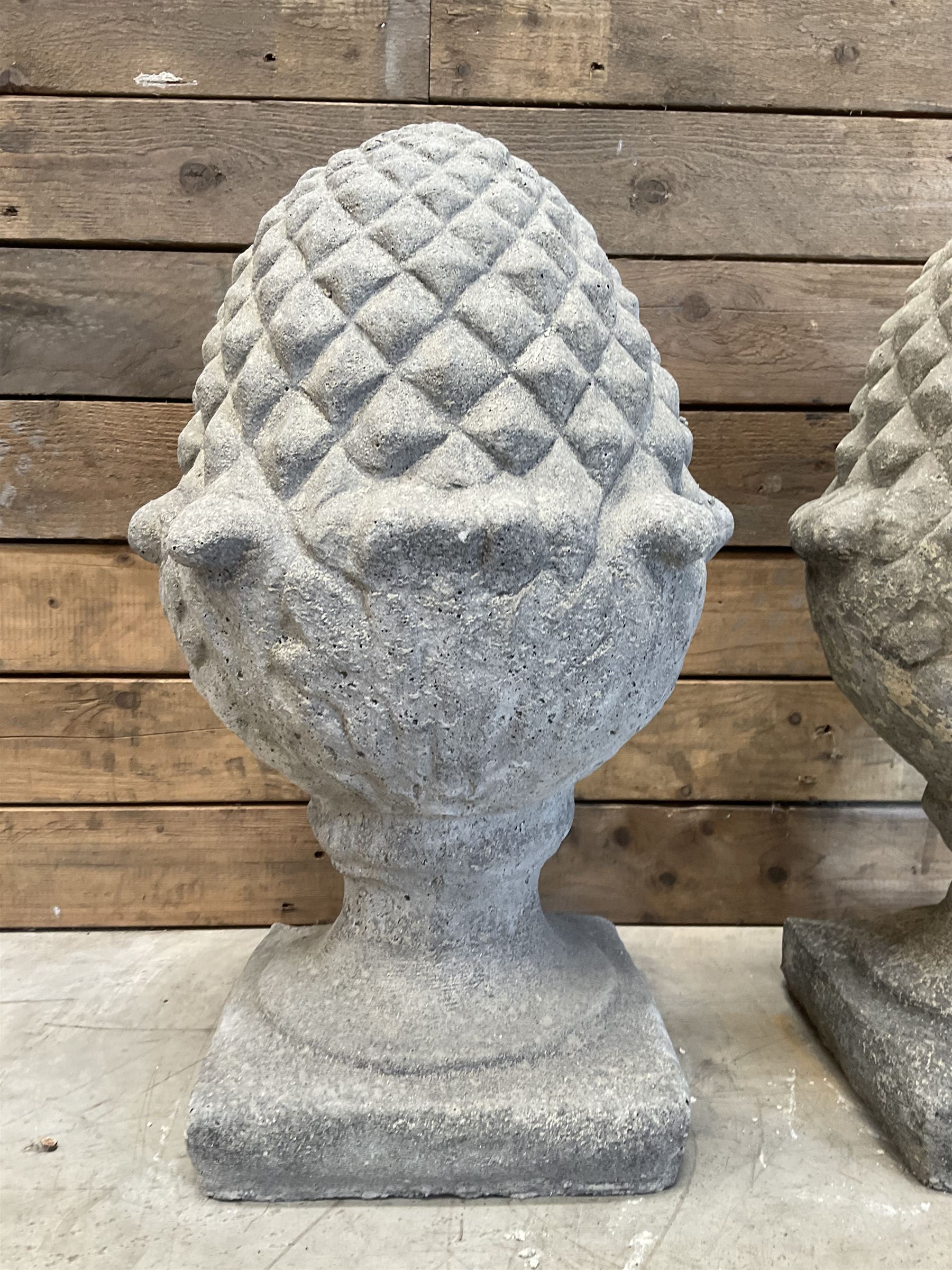 Pair of cast stone Pineapple wall top or gatepost pier finials