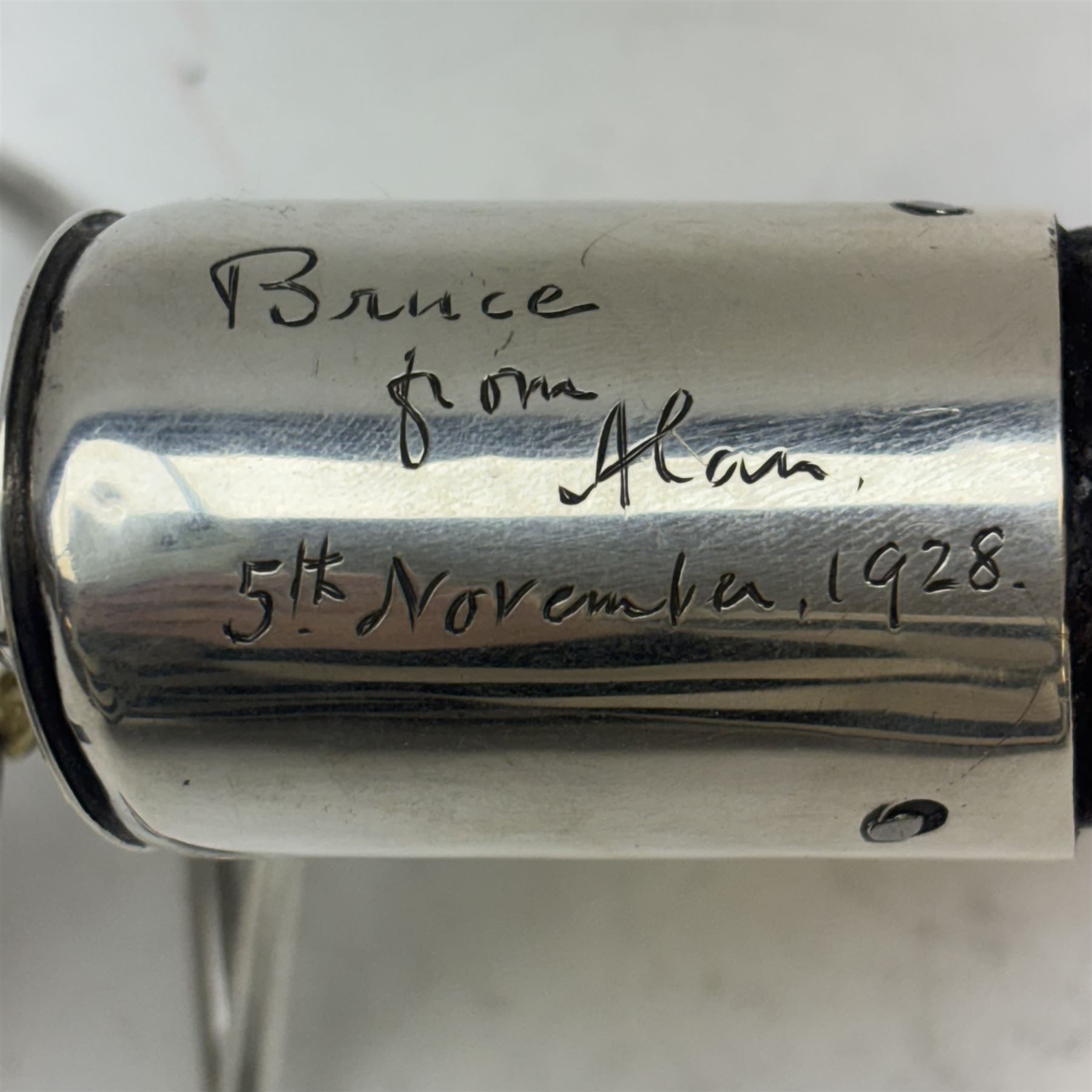 Early 20th century silver and blackbuck horn table lighter, the spherical burner in gimble, mounted and supported by two curved silver feet and horn, hallmarked Asprey & Co Ltd, London 1928, approximately L50cm


