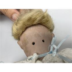 Simon & Halbig for Kammer & Reinhardt bisque head doll with applied hair, pierced ears, sleeping eyes, open mouth with teeth and tongue and composition body with jointed limbs, marked 'Halbig K (& in star) R' H35cm