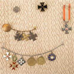 WWI German miniature medal group upon a dress chain, comprising 1914-18 Cross of Honor, Iron Cross and Long Service Medal, together with other miniatures including Order of the Red Eagle First Class, Order Of St. Gregory The Great; Commander’s Cross etc 