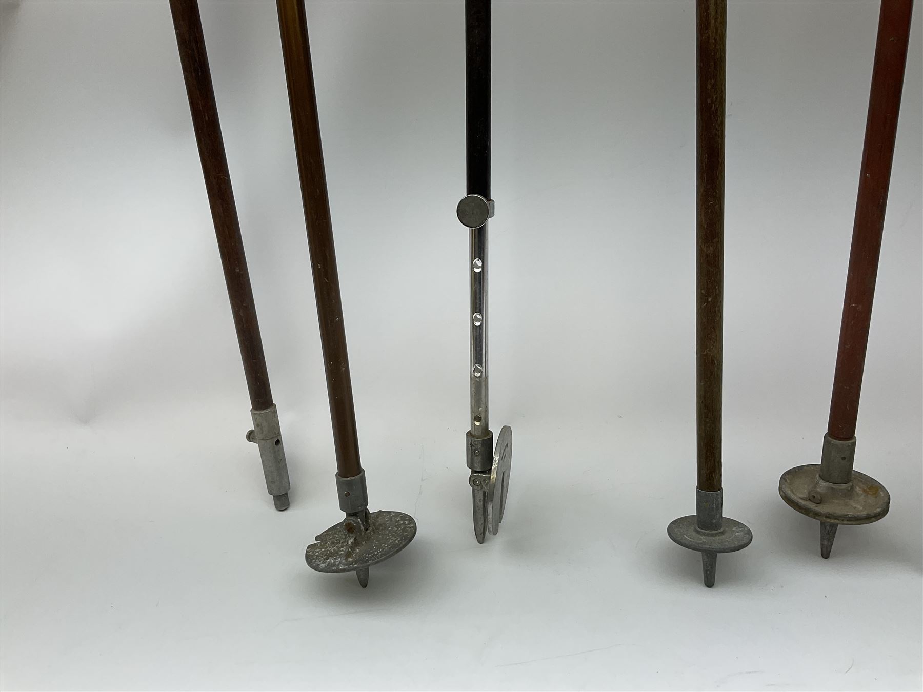 Adjustable Gamebird shooting stick, together with Mills Munitions shooting stick, Featherwate shooting stick, five others and two wooden walking sticks.  