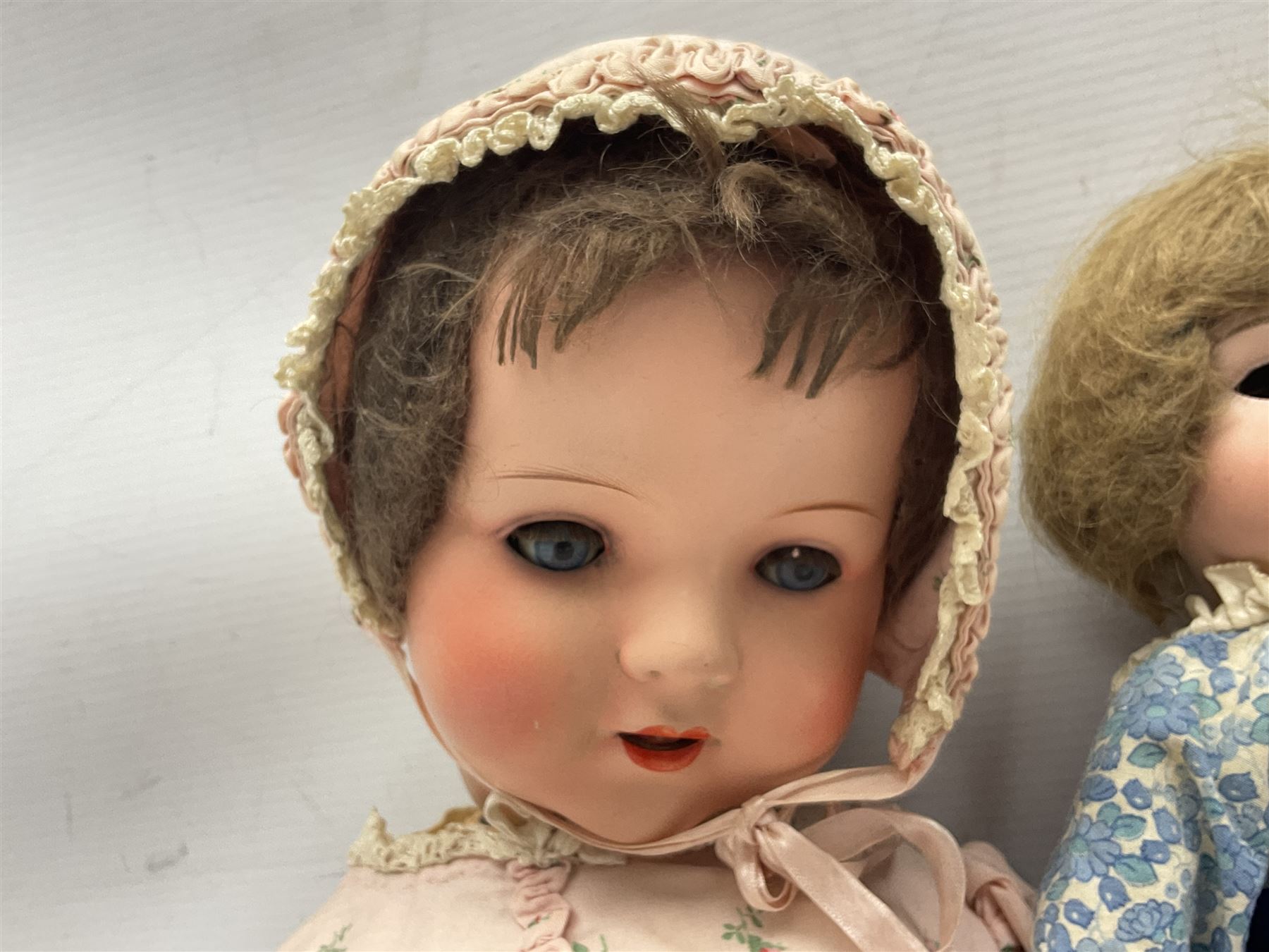 Armand Marseille Koppelsdorf composition head doll with applied hair, sleeping eyes, open mouth with teeth and tongue and composition body with jointed limbs, marked 'AM Koppelsdorf 970 Germany A.7.M' H55cm; Armand Marseille bisque head doll with applied hair, open mouth with teeth and composition body with jointed limbs, marked 'Armand Marseille 390n DRGM 246/1 A3/0M'; Fleur de Genet costume doll; and quantity of 1930s doll's house furniture