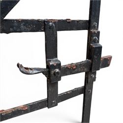 Georgian wrought iron single strapwork gate of small proportions, with scroll design and hinged latch