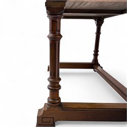 Late Victorian mahogany side table in the style of Gillows of Lancaster, mahogany rectangular top above two frieze drawers, the top edge of the right drawer stamped 'Gillow' and 'L486' with knob handles supported on turned stop and fluted legs with stretcher base on recessed castors

Provenance: The Davies-Cooke Collection from Gwysaney Hall, North Wales  