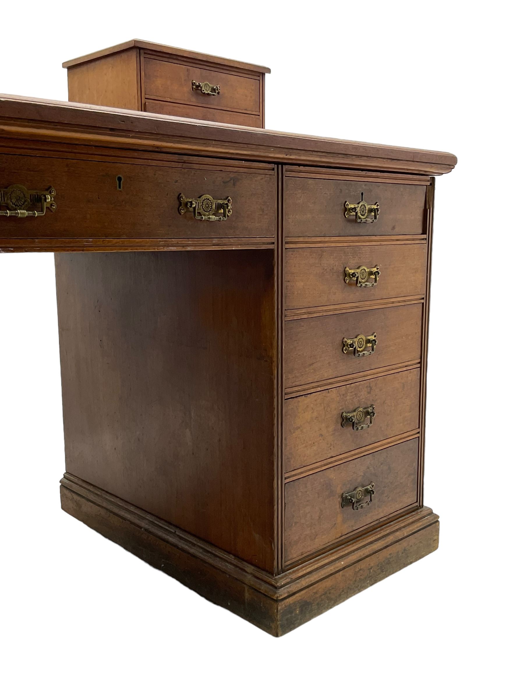 C. Hindley & Sons (London: 1820-1892) - Late Victorian walnut twin pedestal desk, the rectangular moulded top surmounted by two banks of two drawers over eleven graduating drawers, on moulded plinth base, the central drawer stamped 'C. Hindley & Sons, 134 Oxford Street, London, 5298'