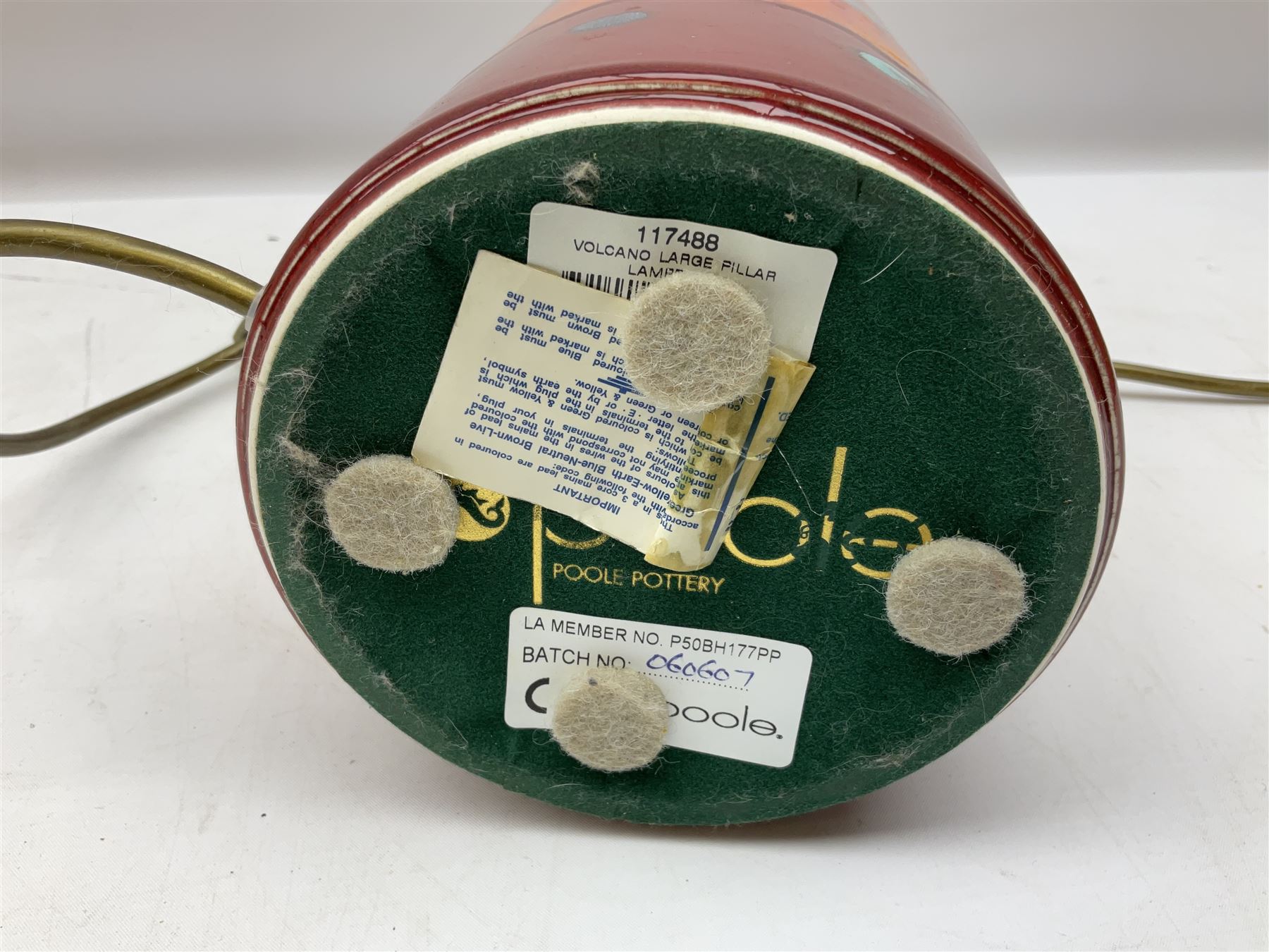 Poole Pottery table lamp in Volcano pattern of cylindrical form, with a cream lampshade, lamp H30cm