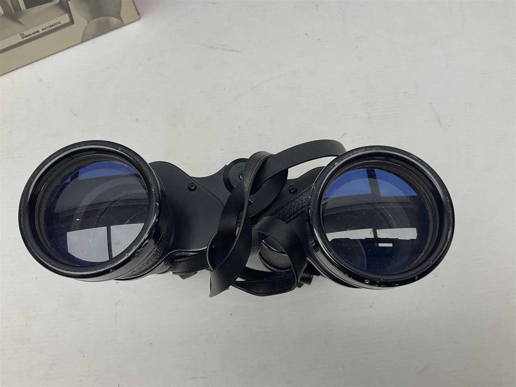 Pair of French binoculars by A.Tubeue Paris, together with three other pairs of binoculars including Telemax 5, Tasco Zip and Hanimax examples and a Panavue automatic slider viewer