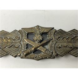 WW2 German Army / Waffen-SS Close Combat Clasp (Nahkampfspange) in bronze with backing plate, original pin and sunken catch; marked verso “FEC.W.E PEEKHAUS BERLIN” and “AUSF. A.G.M. u. K GABLONZ” L9.5cm