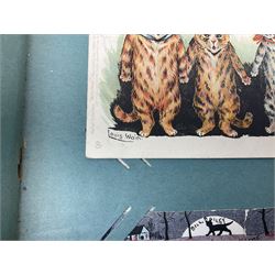 Album containing approximately four hundred Edwardian and later postcards including three Louis Wain, comic cards by Tom Browne, Phil May etc, British and Foreign topographical including real photographic and local, Coronation trams, actresses etc; and large quantity of loose postcards including WW1 Belgium views and caricatures, Royalty portraits etc, 