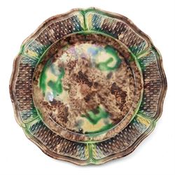 Pair of 18th century cream ware Whieldon type plates decorated with a mottled tortoiseshell glaze D20cm and two other similar plates of shaped circular design