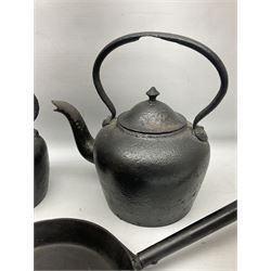 Two cast iron kettles to include Kenrick & Sobs 8 Pints example, cast iron pan and irons