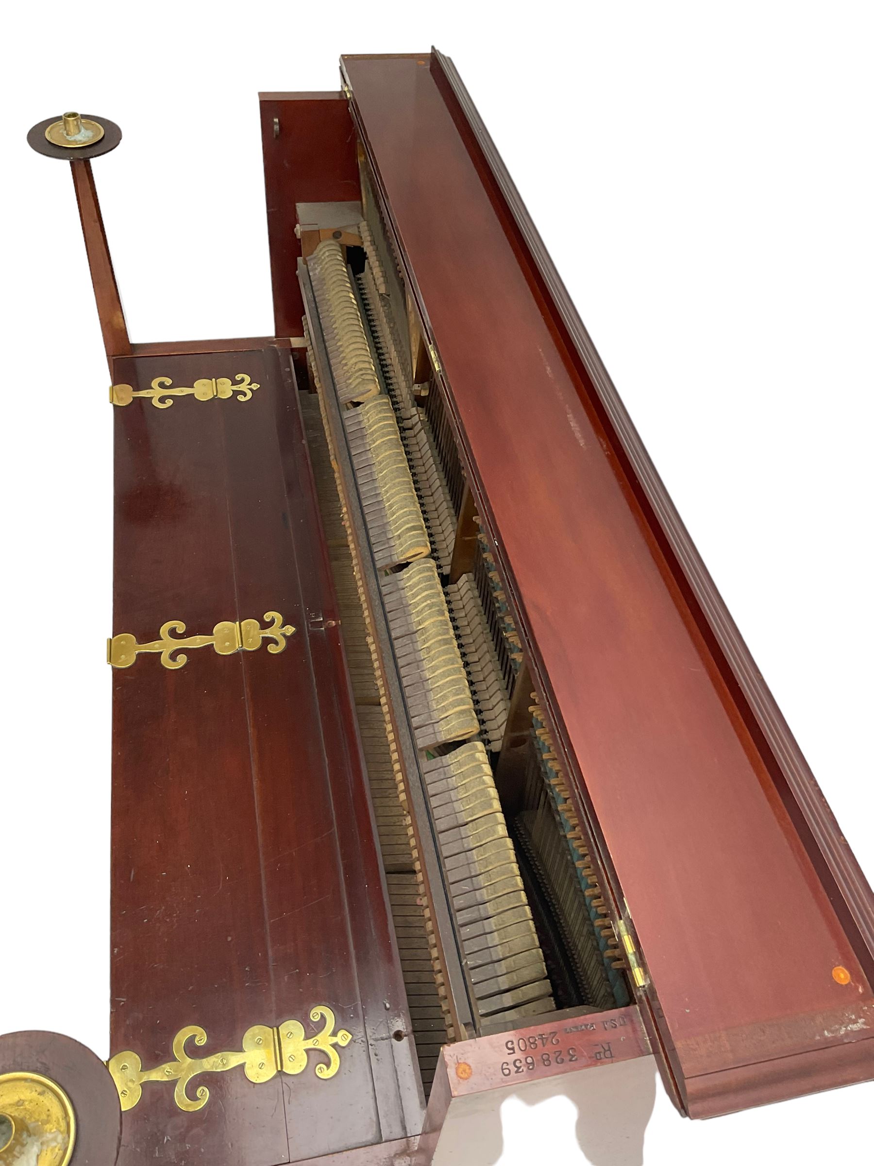 Carl Bechstein - late 19th century German overstrung upright piano, in a model 4 Arts and Crafts case designed by Walter Cave, with a lattice music desk and fretted silk backed front panel, brass hinged case lid and key fall with square tapered candle holders and circular sconces, iron frame, serial number 52187 (1899-1900), with an under damper action, 85 ebony and ivory keys, sustain and una corda pedals, original action, stringing, dampers, and action return straps, registered case number 328639, USA patent 24805.

This item has been registered for sale under Section 10 of the APHA Ivory Act