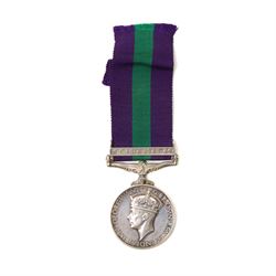 To T/14710083 Dvr S E Thompson R.A.S.C.George VI General Service medal with S E Asia clasp, two Pakistan medals, German Munchen medal, Italian paper knife in the form of a sword and other items