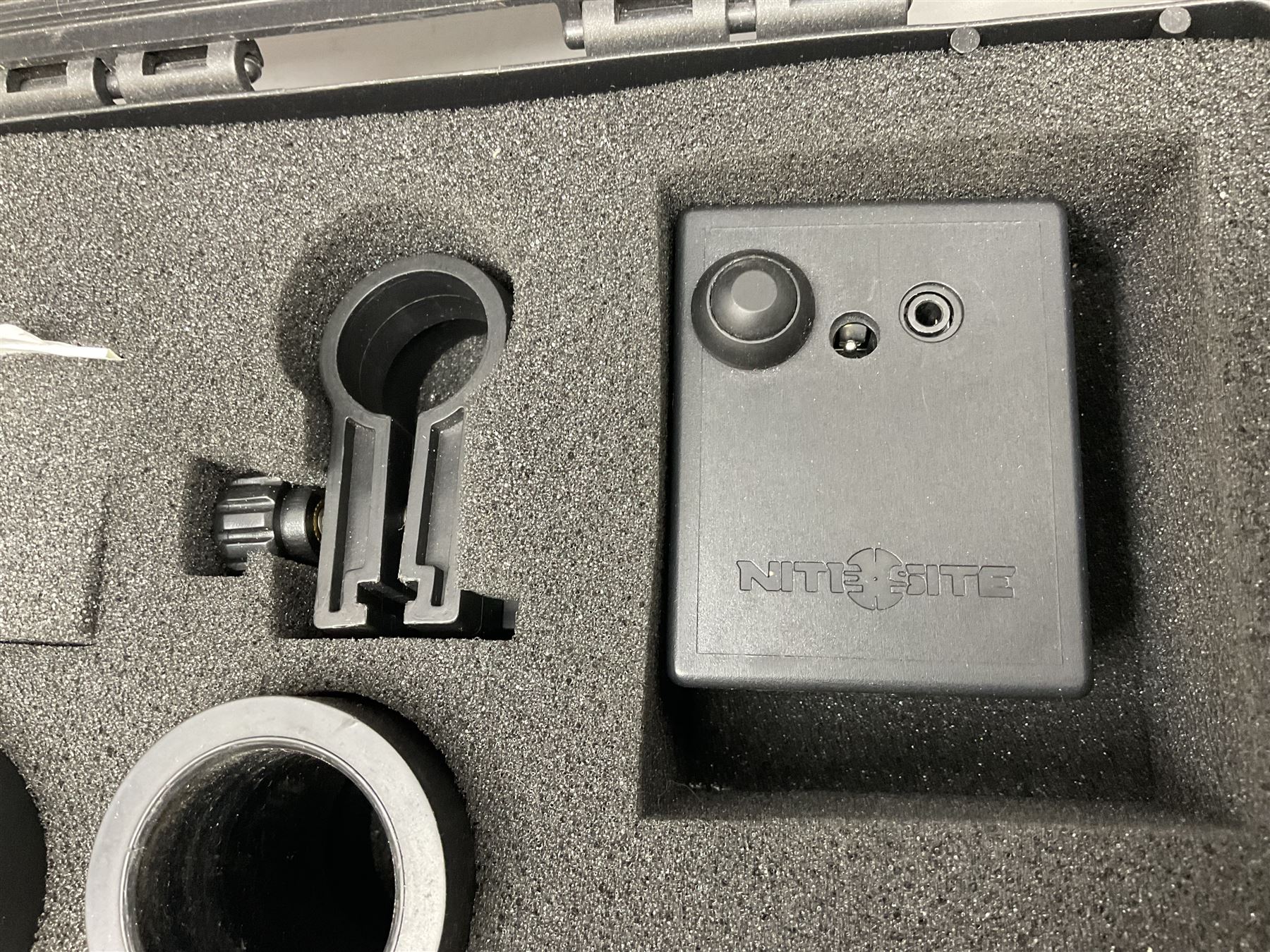 Two Nite-Site add-on kits in hard plastic carrying cases; one with charger