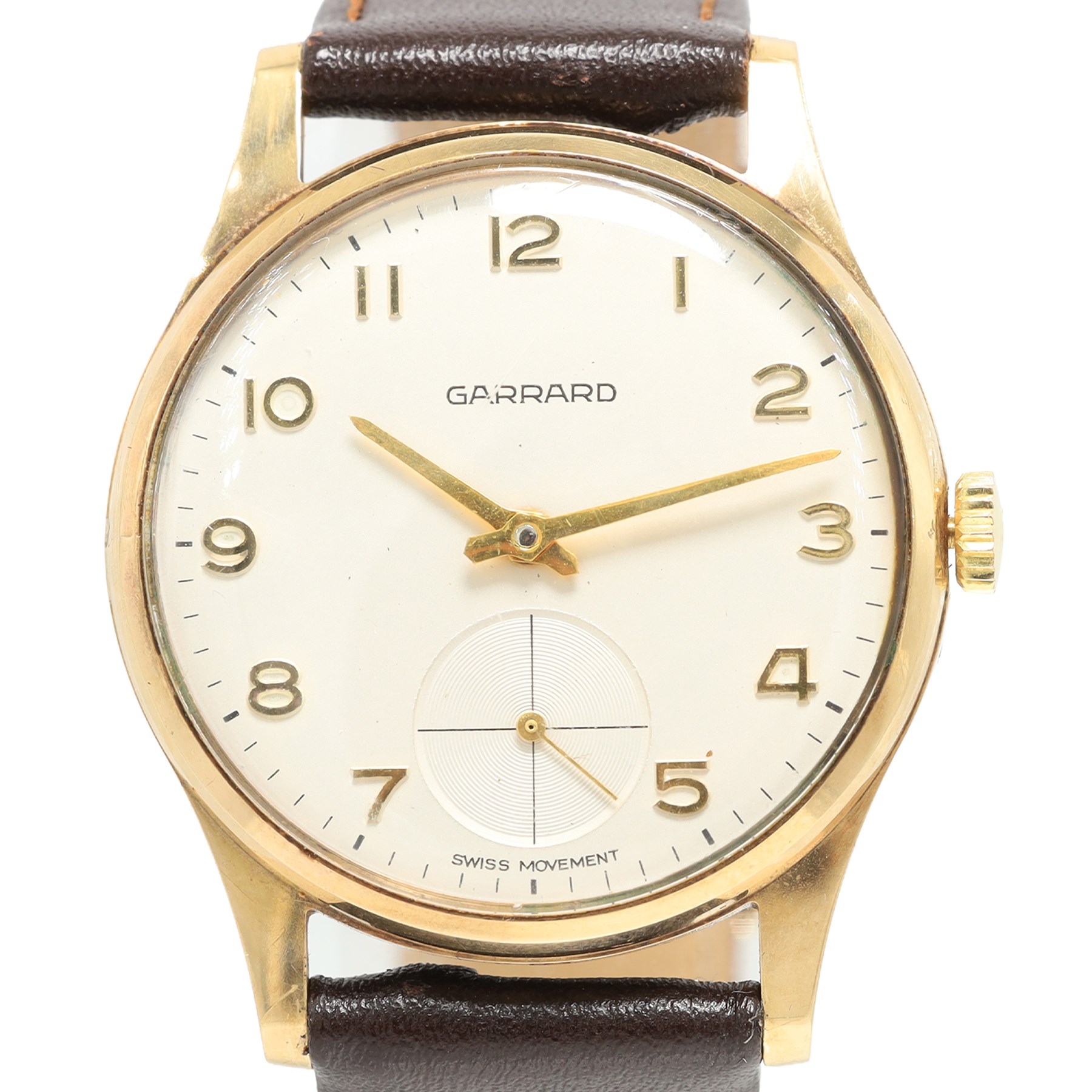 Garrard gentleman's 9ct gold manual wind wristwatch, silvered dial with Arabic hour markers and subsidiary seconds dial, the back case with personalised engraving, London 1974, on brown leather strap