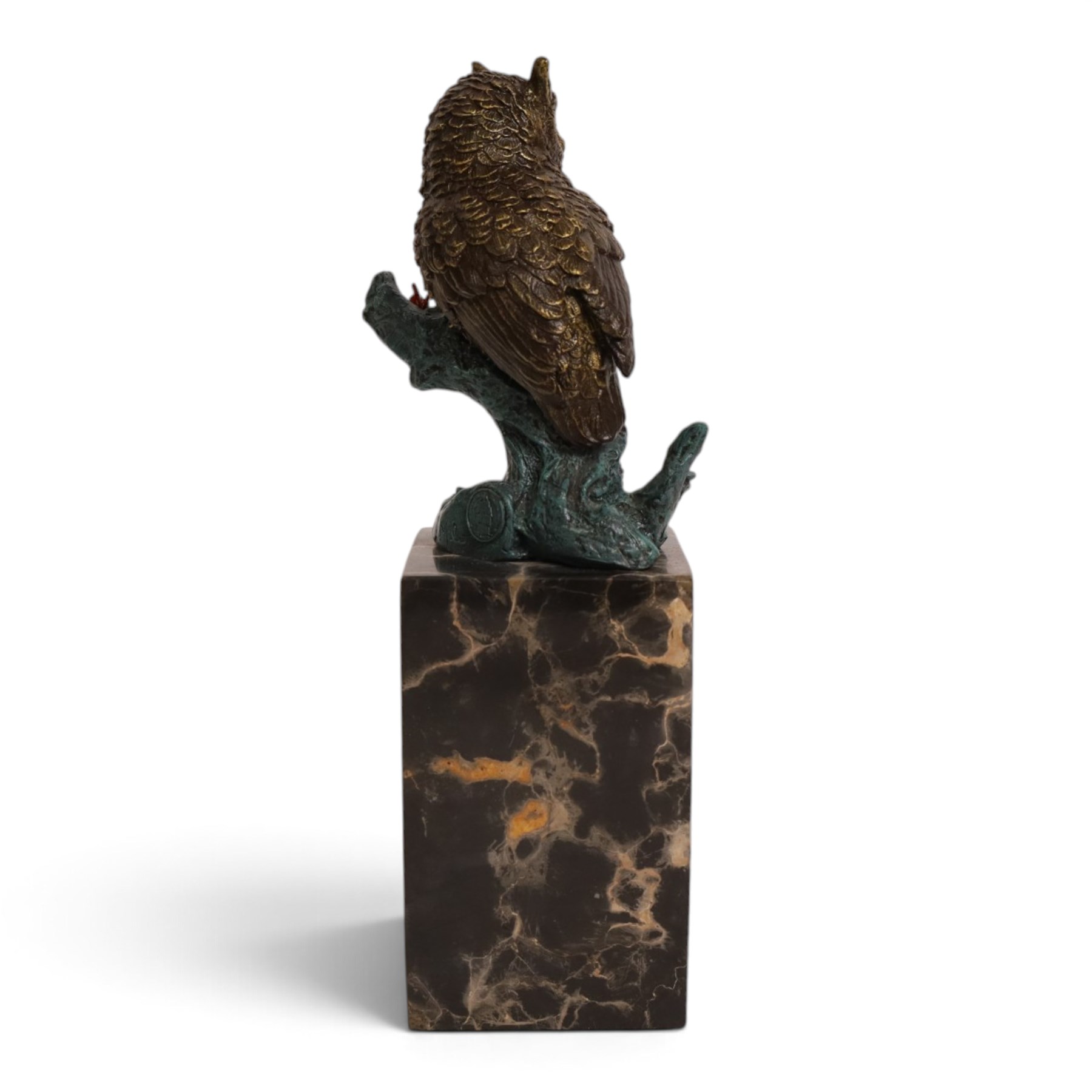 Cold painted bronze figure, modelled as an owl perched upon a tree stump signed Milo and with foundry mark, raised upon black veined marble plinth, H28cm