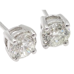  Pair of 18ct white gold diamond stud earrings, total diamond weight 1.24 carat with World Gemology Institute certificate  