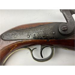 Re-manufactured percussion converted from flintlock single barrel pistol, the 20cm barrel with ramrod under, reused back action lock, brass furniture and hardwood stock L41cm overall
