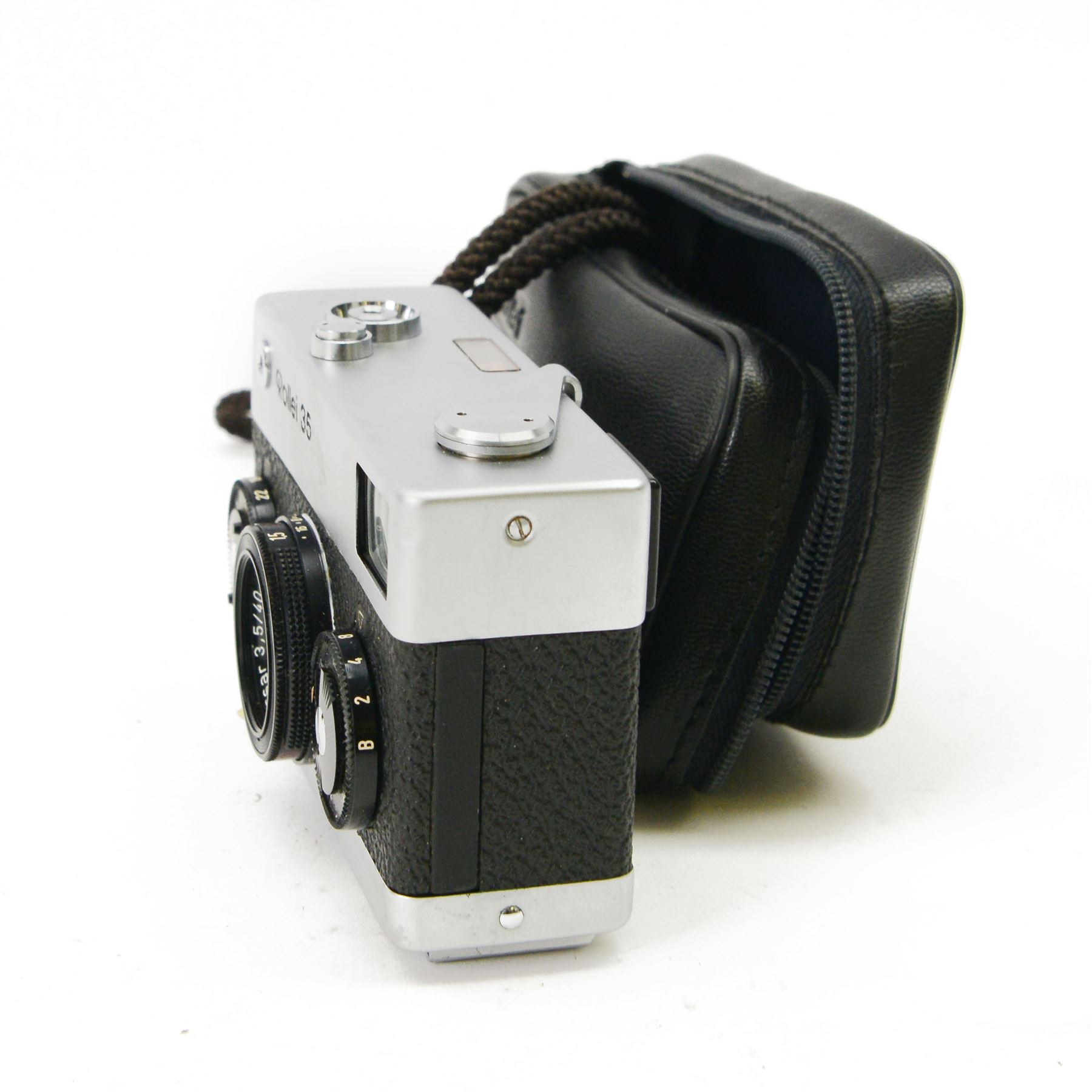 Rollei 35 35mm compact viewfinder camera made in Singapore, with Tessar 3.5/40 lens in silver and black finish serial no. 6221766, in a Rollei soft shell case