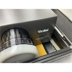 Cased Rollei projector together with a palar projector screen, autofocus slide projector and cenei scoper 360 