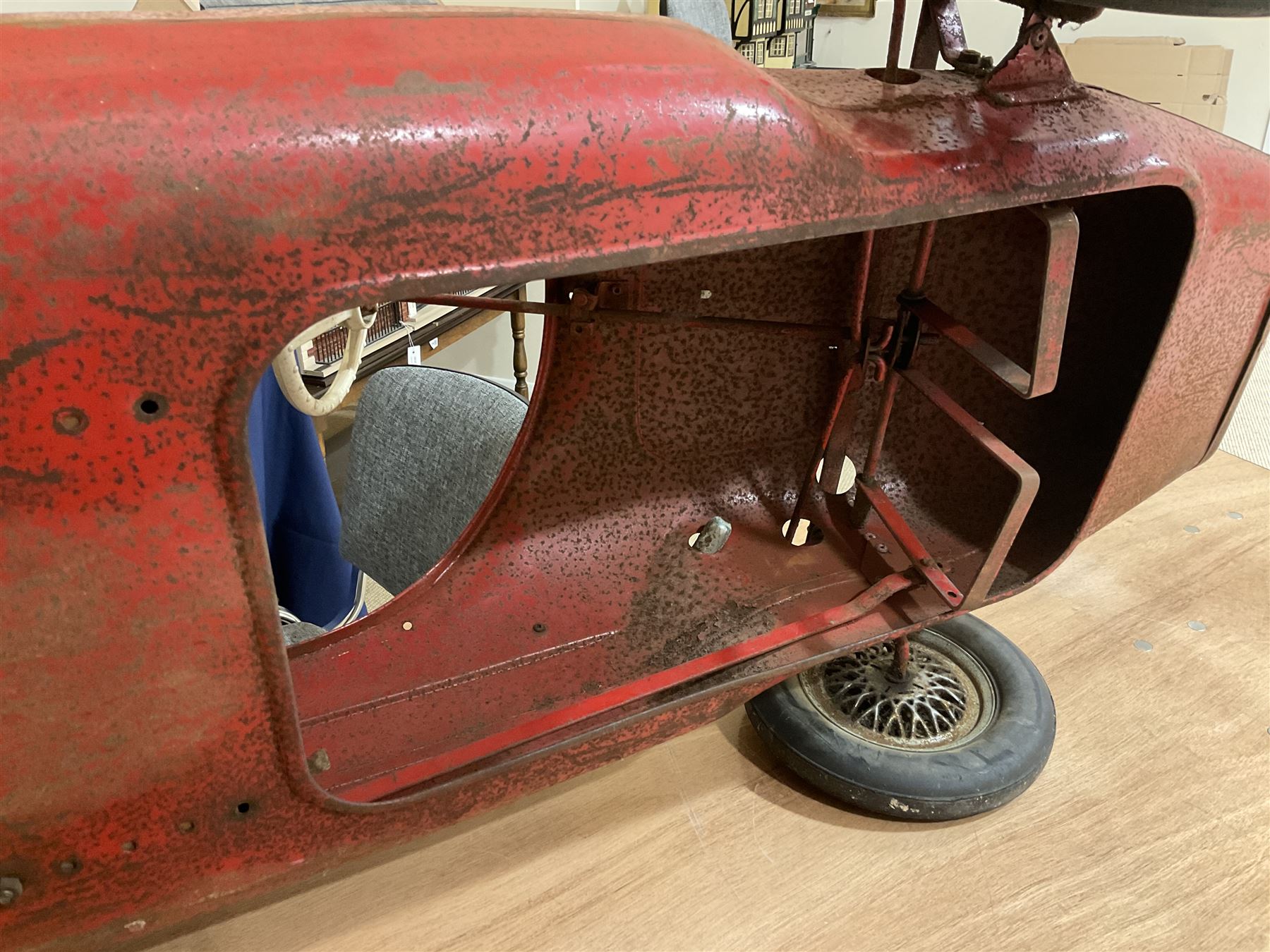 Tri-ang pressed steel Grand Prix Vanwall child’s pedal racing car, English 1960s, finished in red with racing No.3, original white plastic steering wheel, metal bucket seat, bonnet air intake, chrome plated side exhaust, chrome spoked wheels with chrome plated spinners, black solid rubber tyres L121cm W53cm H46cm)