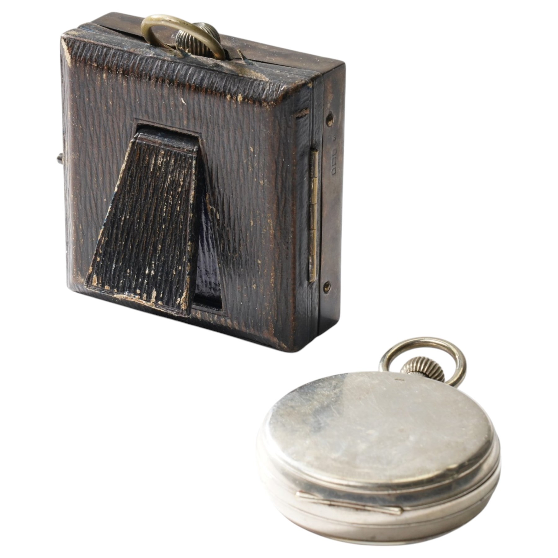 Early 20th century nickle cased goliath pocket watch by Jays, London, in silver engine turned travelling case London 1913 and one other nickle cased goliath pocket watch