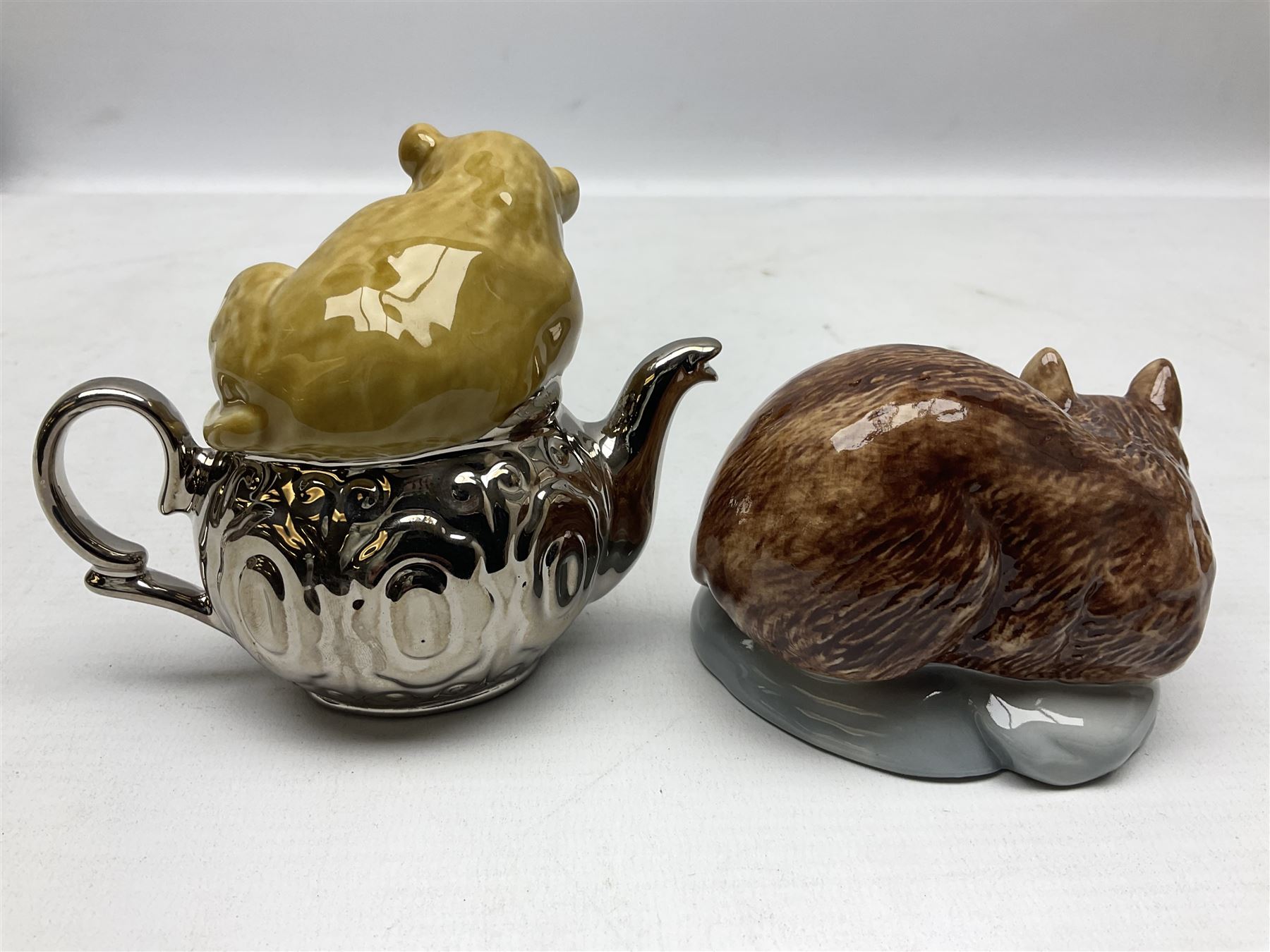 Thirteen Wade Collectors Club figures, comprising six Alice in Wonderland figures; Queen of Hearts, Alice, Mad Hatter, The Doormouse, White Rabbit and Cheshire cat, six Cinderella figures; Fairy Godmother, Cinderella Ready for the Ball, Prince Charming, Cinderella, Clorinda and Thisbe, together with Beauty from Beauty and the Beast, all with original boxes  