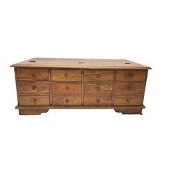 Hardwood multi-drawer coffee table, with hinged lid enclosing storage