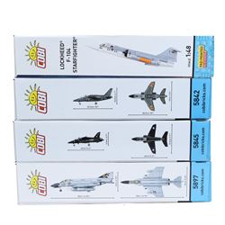 Four Cobi Bricks 1:48 scale Armed Forces model aircraft sets, comprising no. 5897 F-4 Phantom II, no. 5907 Lockheed F-104 Starfighter, no. 5845 BAe Hawk T1 and no. 5842 Alpha Jet, all in sealed boxes