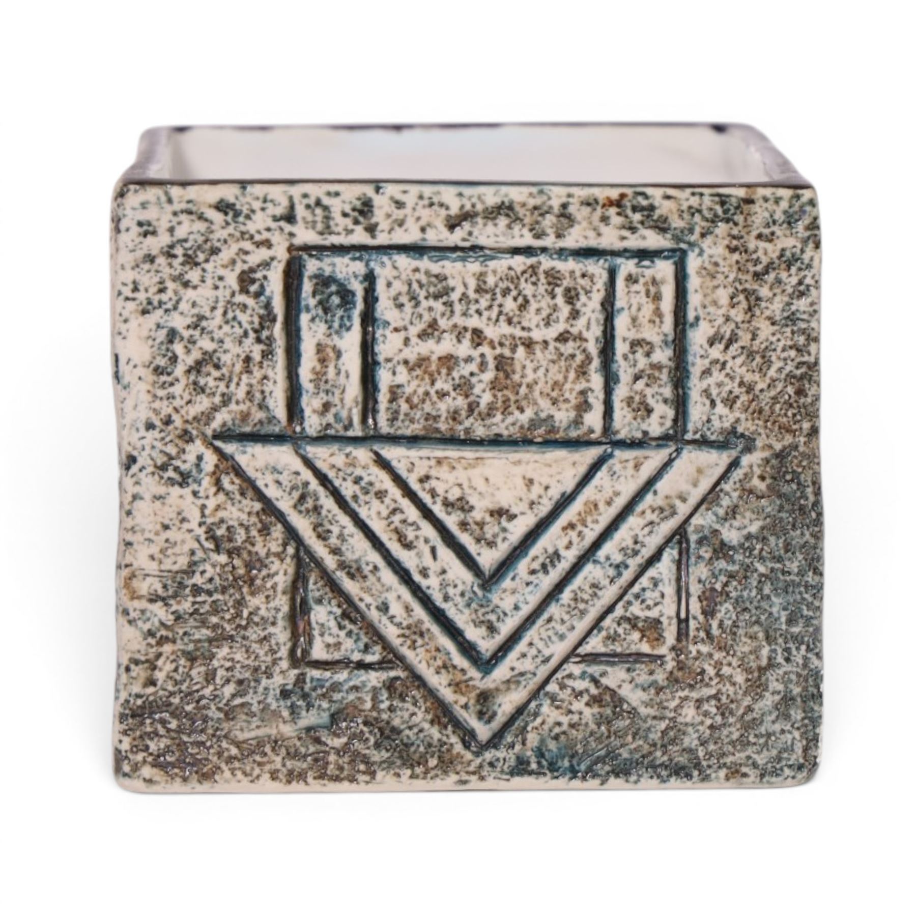 Troika cube vase by Anne Lewis, with geometric incised decoration in blue on a mottled blue ground, signed to base with initials