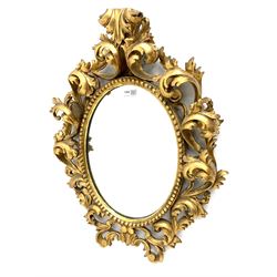 Rococo style gilt wood wall mirror, oval plate