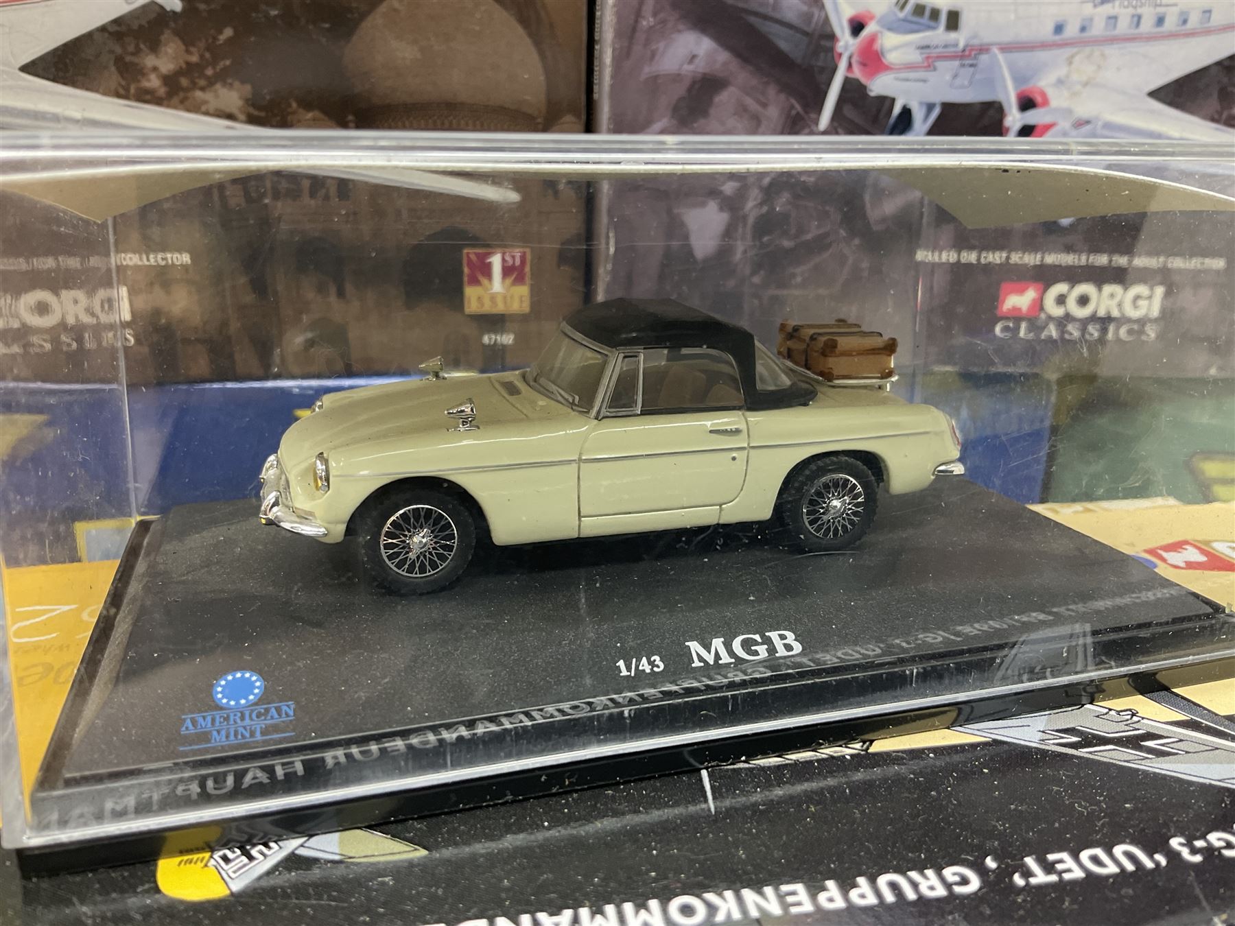 Fifteen modern die-cast models of aircraft by Corgi, Atlas Editions and Ixo including Aviation Archive, War Birds, Fighters of WWII etc; and model of an MGB Sports Car; all boxed (16)