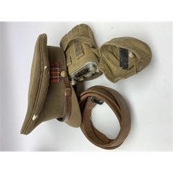 Scots Guards - two officer's peaked caps with chin strap and side buttons, one with badge, and blue dress peaked cap marked HEB for Harold Ellett-Brown; two Artist Rifles and one West Yorkshire cap badges and two Scots Guards shoulder flashes; officer's brown leather Sam Brown belt with shoulder brace strap and revolver holster; officer's Orilux trench torch etc