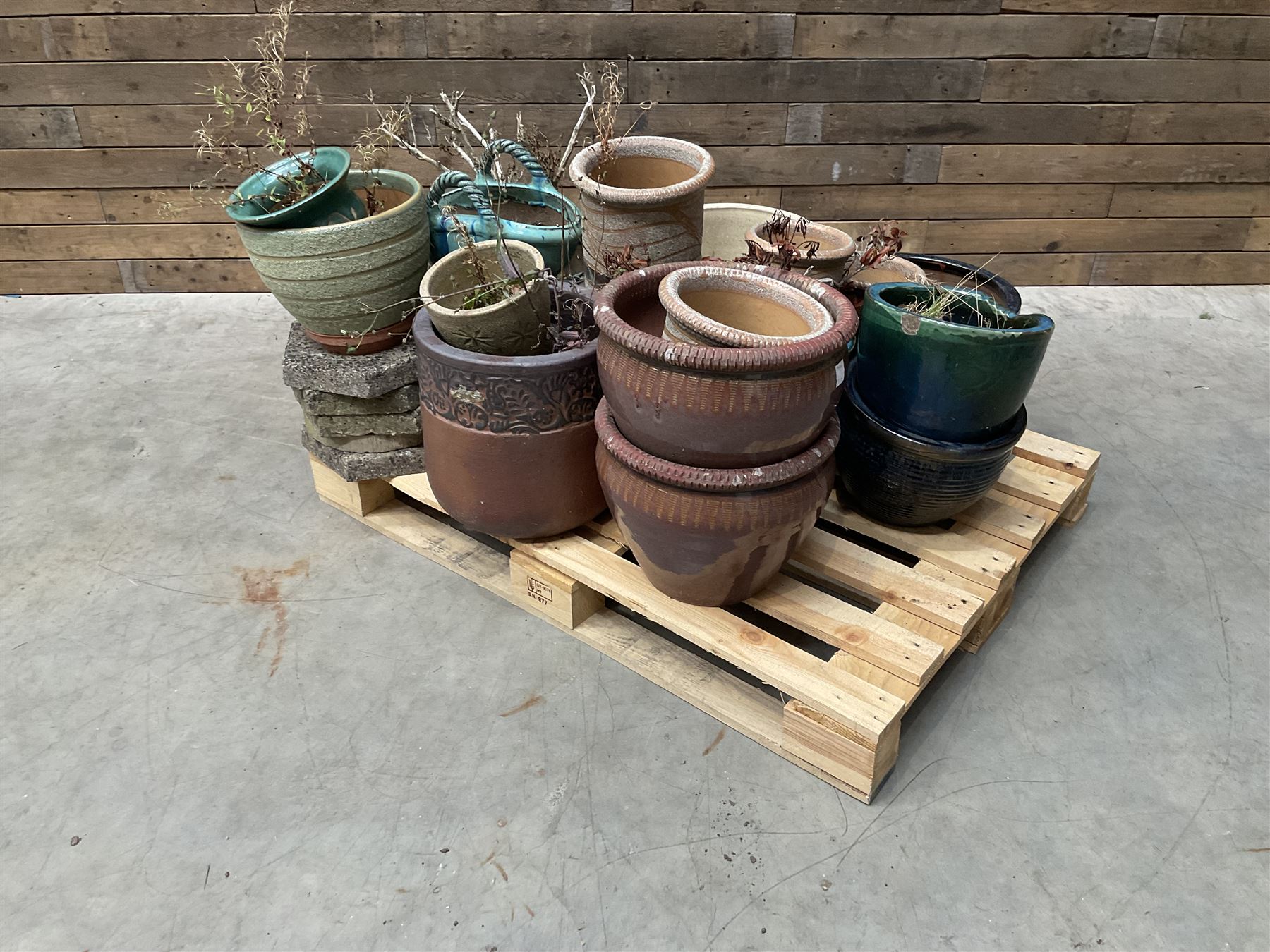 Large collection of ceramic plant pots and paving slabs, (26)