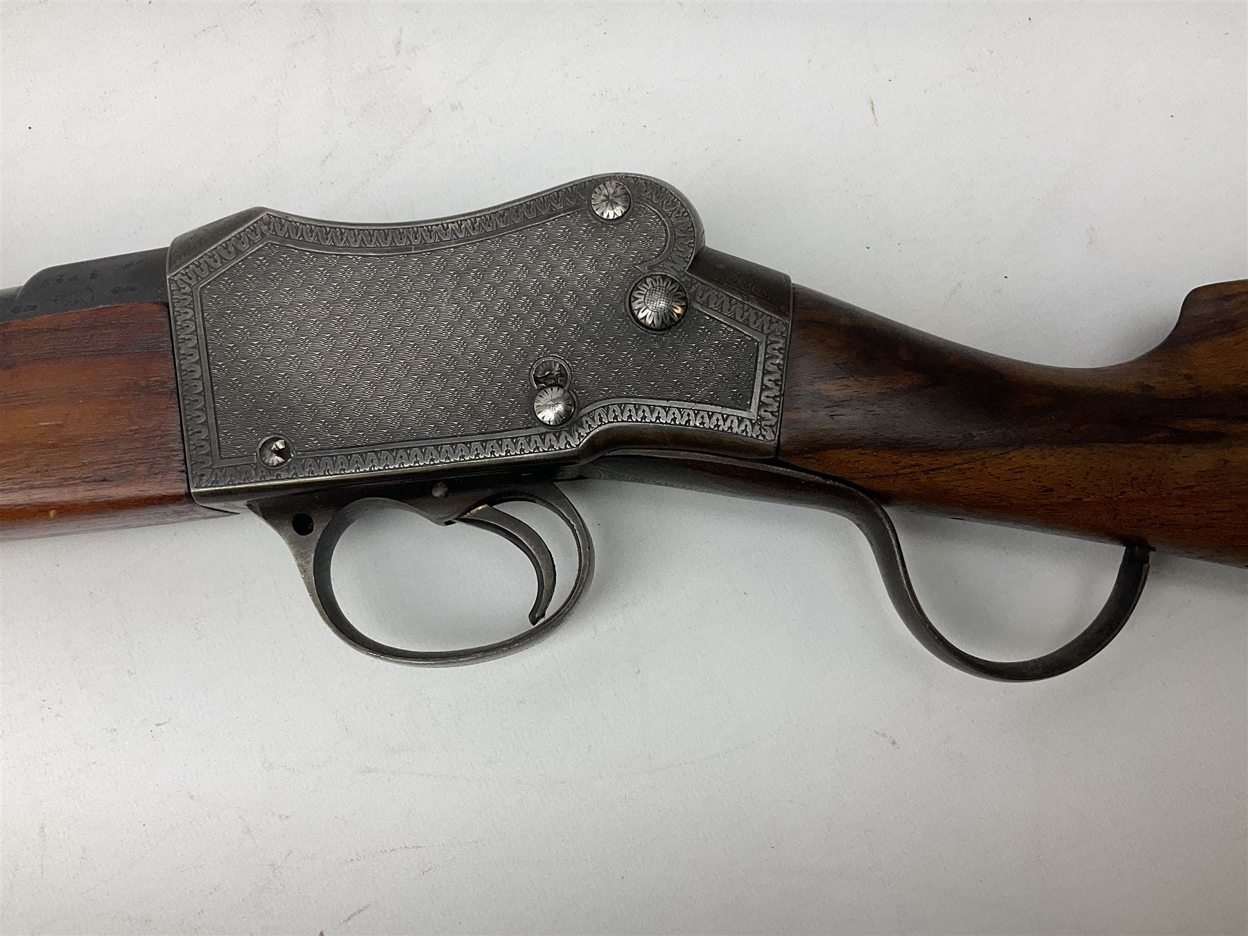 Manton .577/450 Martini Henry rifle, the 82.5cm smooth bored barrel proofed for shot, two barrel bands and bayonet fitting, engraved action with side safety, figured walnut stock with chequered steel butt plate, complete with ramrod, NVN other than 5346 on barrel, L125cm