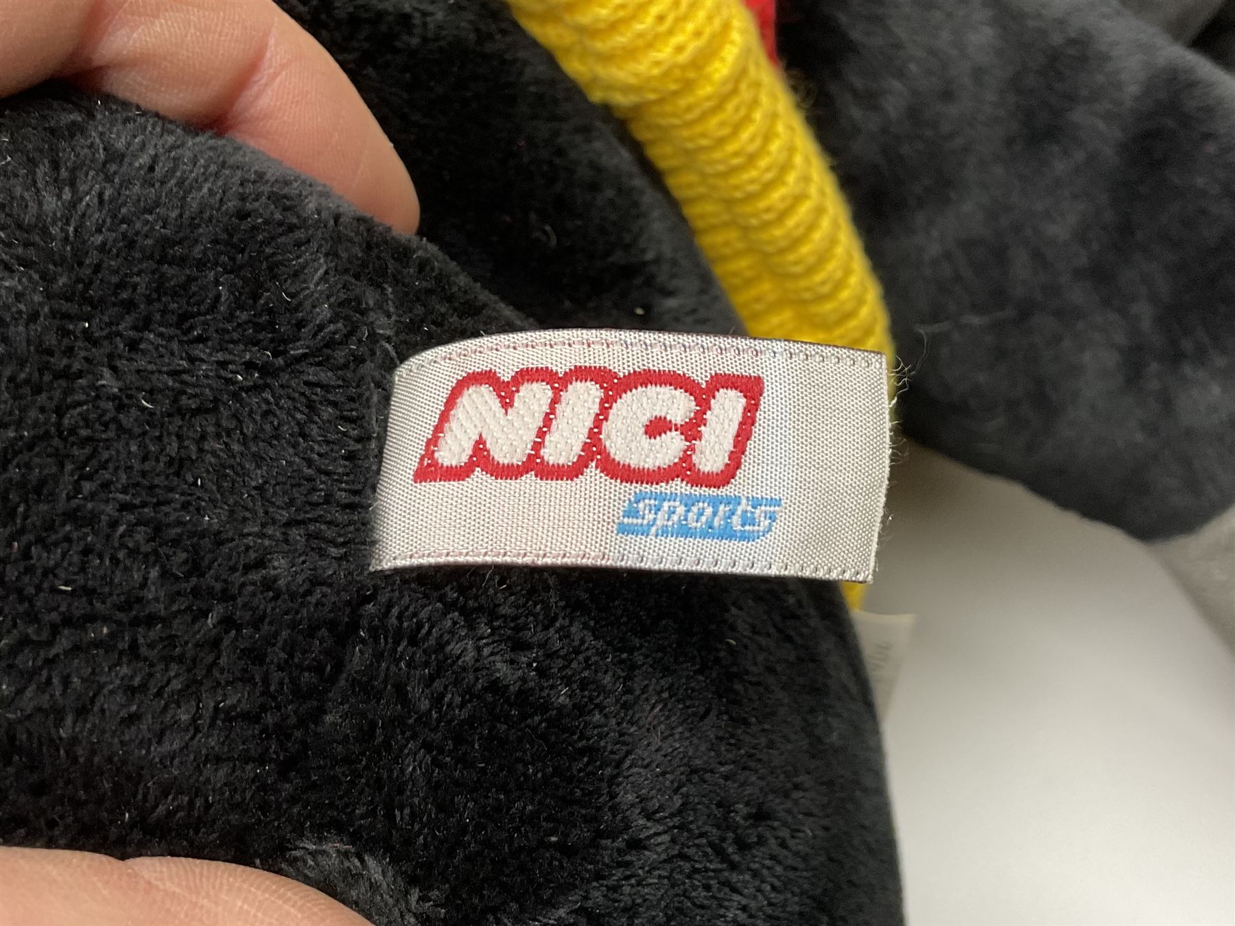 Four large Nici plush toys, comprising of two 'I love Ferrari' horses, with baseball hats, zebra and a black sheep, largest example H115cm 