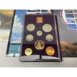 Coins and stamps, including The Royal Mint Great Britain 1970 coin set in plastic holder, 2006 'Brunel' coin cover containing two commemorative two pound coins, Alderney 2006 sterling silver proof five pounds, two 2007 five pound coins in card folders, two limited edition mint first class stamp sheets each comprised of ten first class stamps, various first day covers many with special postmarks housed in 'Royal Mail' boxes etc