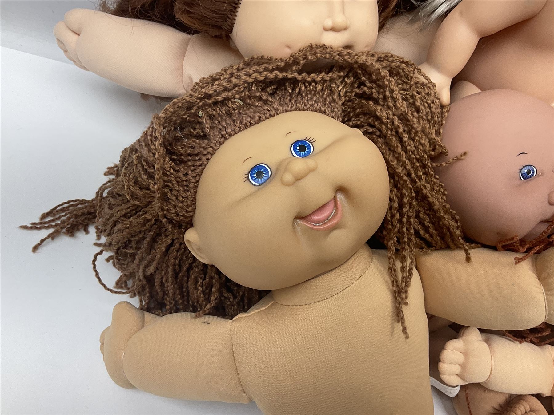 Plush covered soft toy of a swimming duck with squeeze type musical action L17cm; and collection of ten Cabbage Patch type dolls by various makers including Mattel, Hasbro, Appalachian Artworks, Migliorati etc