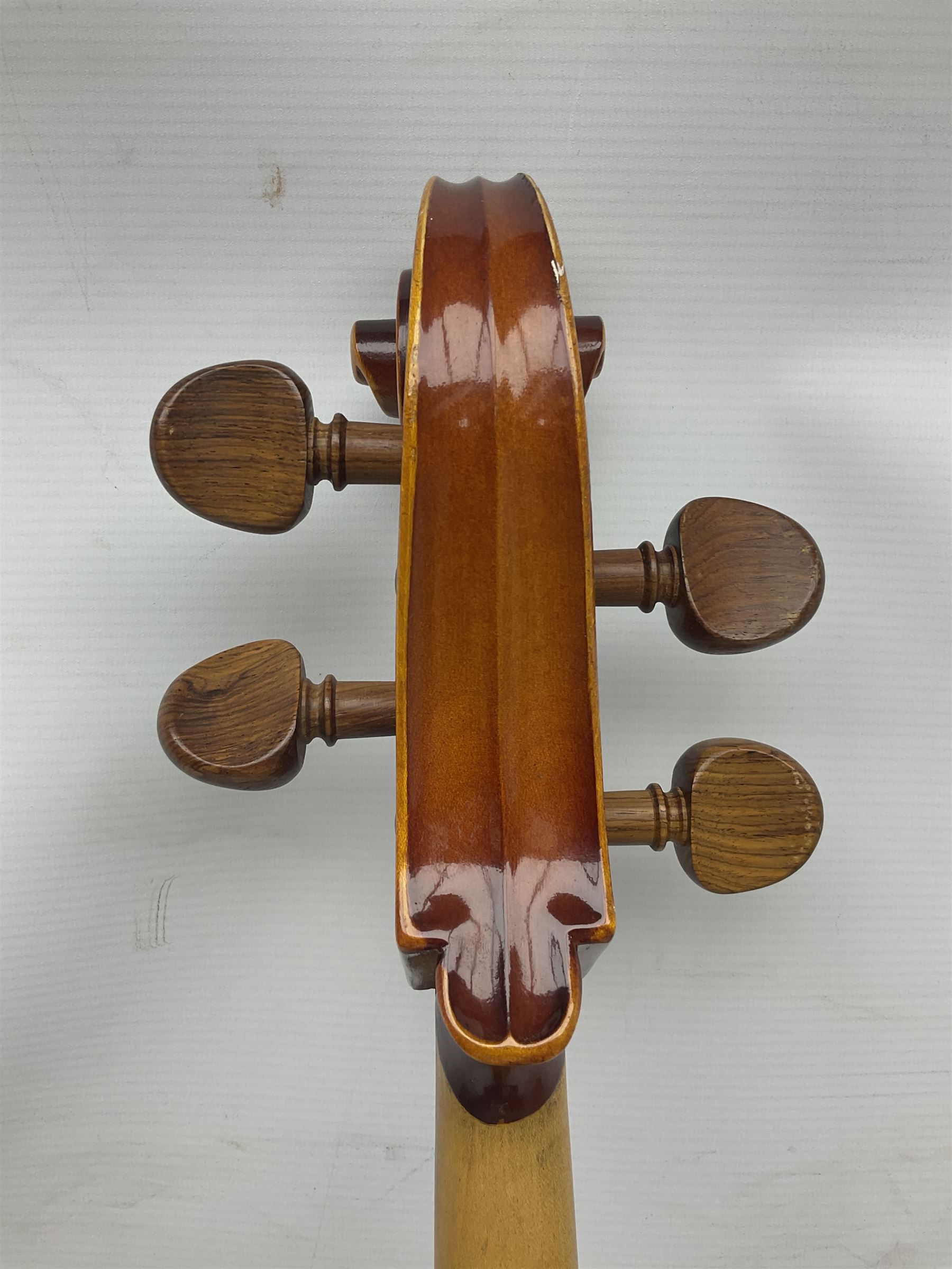 Two student half-size cellos - Boosey & Hawkes Artia with 65cm one-piece back and spruce top; bears maker's label; L104cm overall; and Romanian with 65.5cm two-piece maple back and ribs and spruce top; bears label; L108.5cm overall; each in soft carrying case with two bows (2)