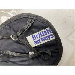 British Airways Concorde - inflight complimentary amenity pack including footwear, menu, stationery, three photographic slides, luggage label, cocktail stirrers, eye shades, fact sheet etc; in original branded blue vinyl bag with used 18th September 1977 ticket from Bahrain to London; together with a Singapore Airlines amenity kit bag with contents