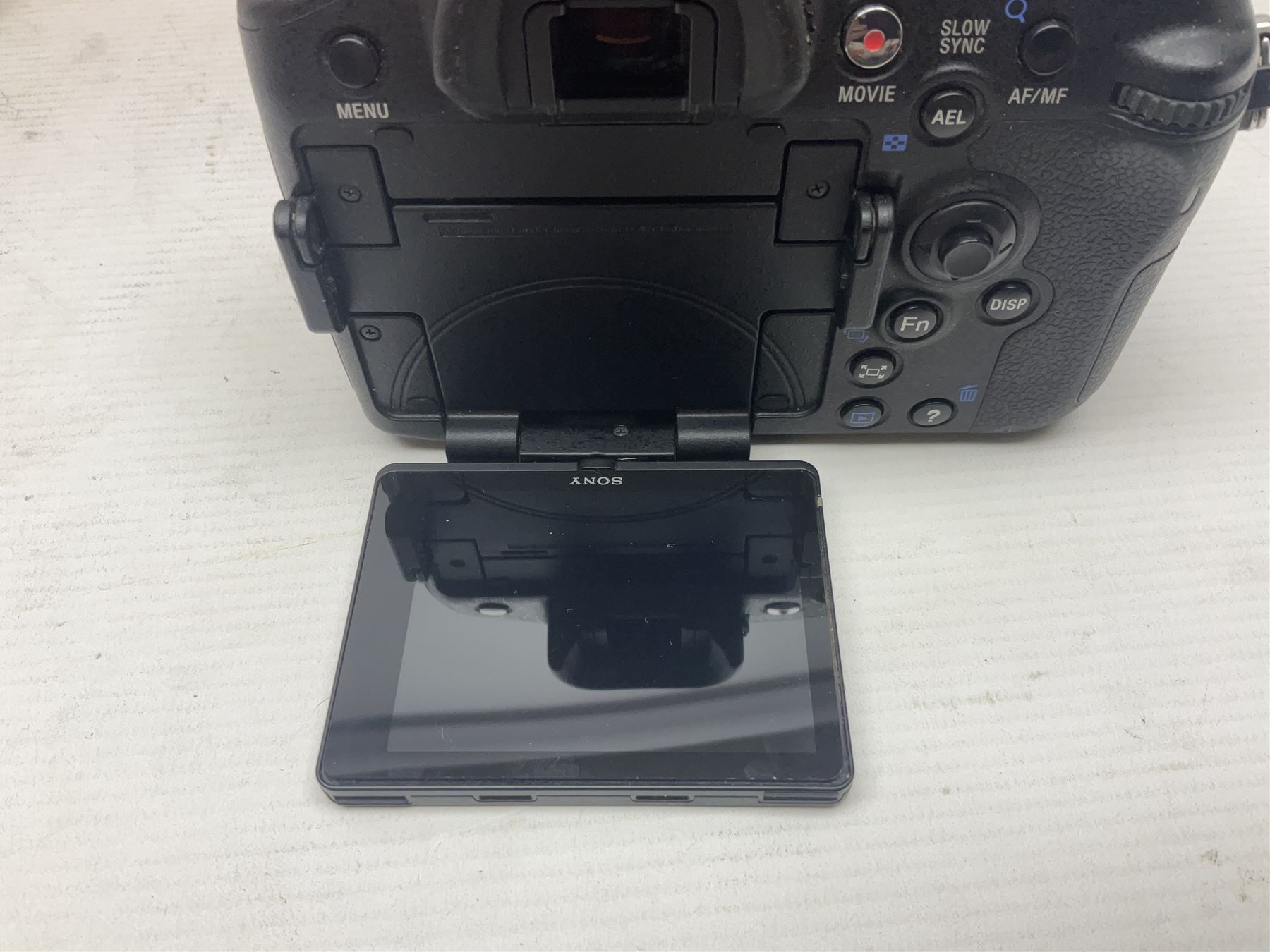 Sony Alpha A700 camera body, serial no 2340937, Sony Alpha A77 camera body, serial no 0715406, together with Sony angle finder and two firm holding grips, all with original boxes  