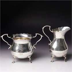 Silver matched five piece tea and coffee set of baluster form engraved with a monogram on shaped supports Sheffield 1913, the teapot 1911, the coffee pot 1924 Maker Mappin & Webb