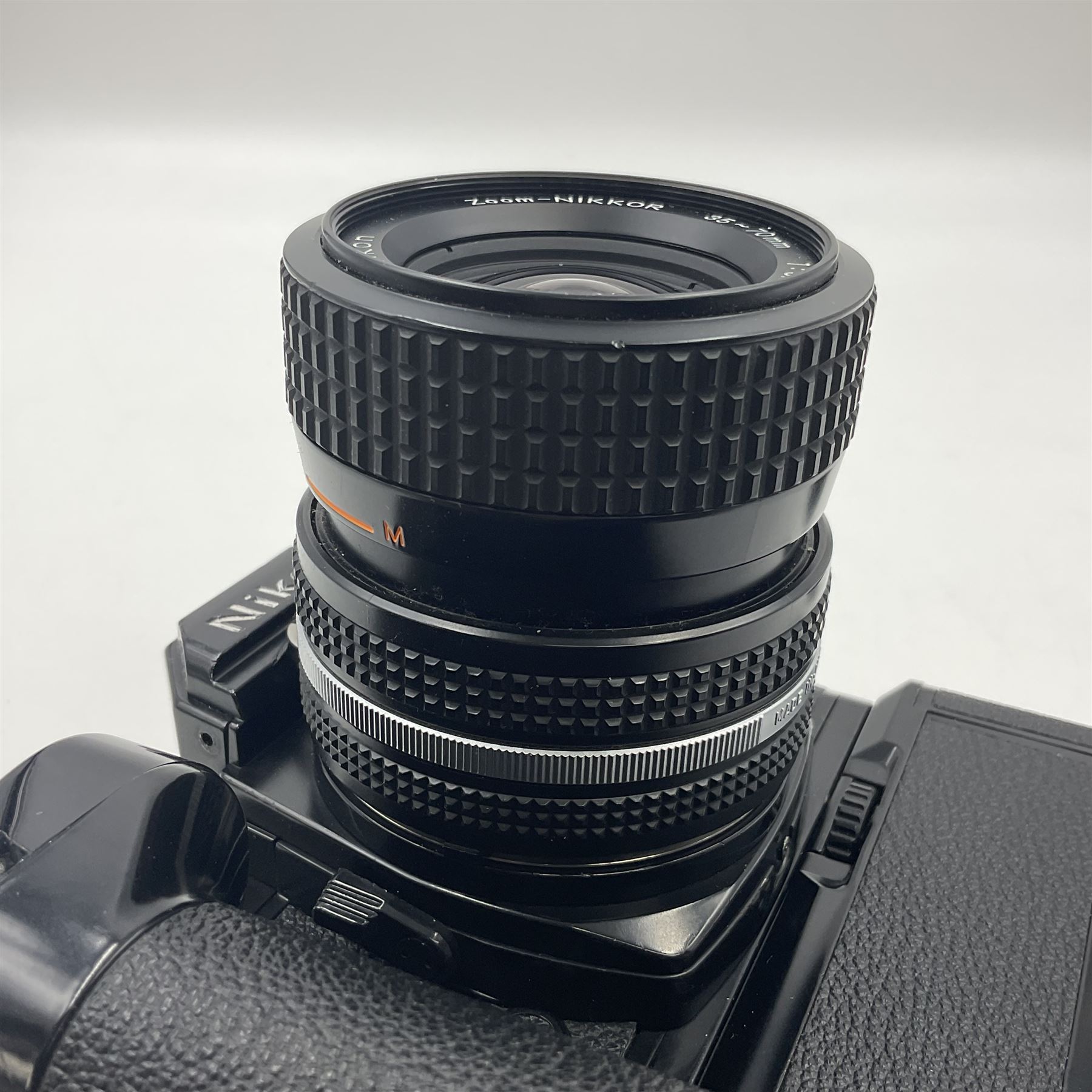 Nikon FM2n camera body, serial no. N8683100, with 'Nikon Zoom-NIKKOR 35-70mm 1:3.3-4.5' len, serial no. 2236565, Nikon MF-16 data back, serial no. 212905 and Nikon MD-12 Motor Drive, serial no 1570382 
