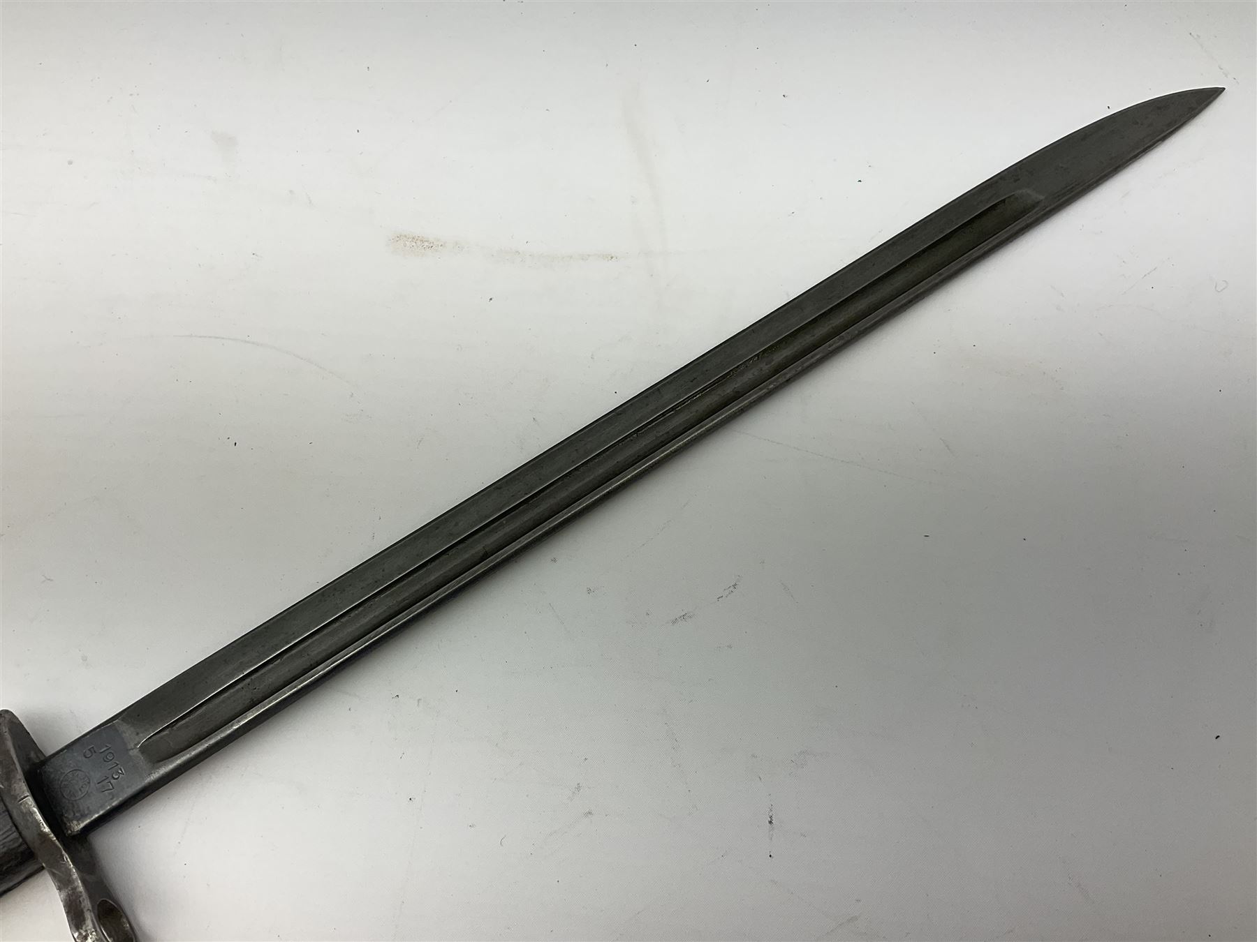 WW1 American Remington P14 rifle bayonet Model 1913, the 43cm fullered steel blade dated 5 17; in metal mounted leather scabbard L57cm overall; and WW1 Canadian Ross Rifle Co.1907 Model Mk.II bayonet, dated 2/17; in leather scabbard with frog (2)