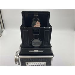 Rolleiflex Series E twin lens camera body, serial no. 1623867, with 'Planar 1.28 f-80mm' lens and 'Heidosmat 1:2.8/80' lens 
