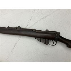 WW1 Lee Enfield SMLE .303 bolt action rifle with 63.5cm barrel and magazine; No.20934; L112cm overall; home deactivated by welding down bolt and end of barrel so requires re-deactivation to modern standards; and 19th century 12-bore double barrel hammer shotgun with 65cm cut-down barrels, non-rebounding hammers and under-lever opening, the lock-plate indistinctly inscribed G.T. Bartrant(?) L75cm overall; home deactivated by welding both barrels closed at breech so requires re-deactivation to modern standards (2) RFD ONLY 