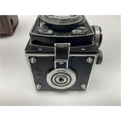 Rollei Rolleiflex 3.5C camera body, serial no 1775847, with 'Planar 1.35 f-75mm' lens serial no 1788432 and 'Heidosmat 1:2.8/75' lens serial no 2440876, complete with a cased set of additional lenses 